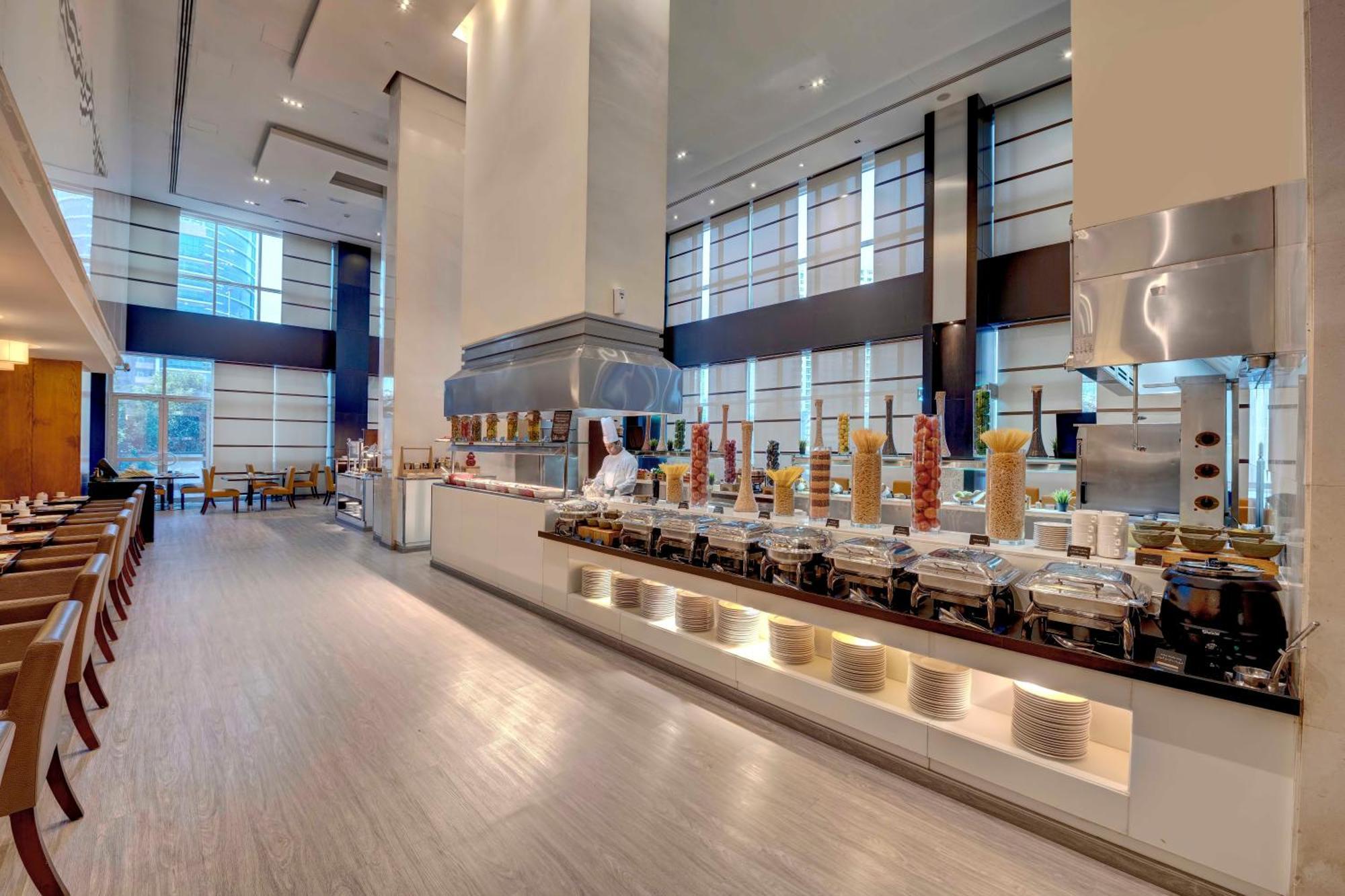 Отель Media Rotana Дубай Экстерьер фото The restaurant